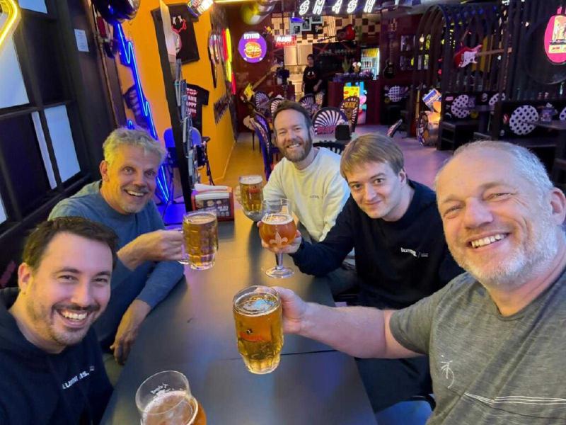 Allon, Peter, Daniël, Lukas, and Jettro have a beer in Antwerp.